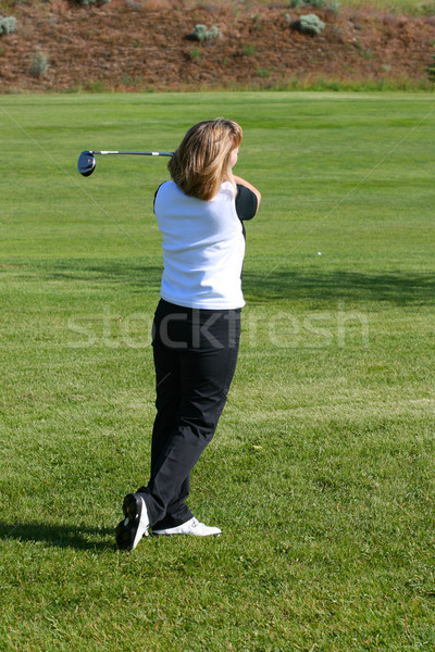 Femminile golfista giocare shot golf Foto d'archivio © vanessavr