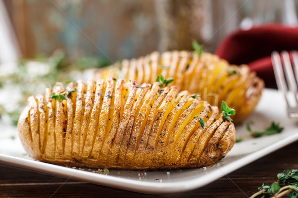 Hasselback potatoes Stock photo © vankad