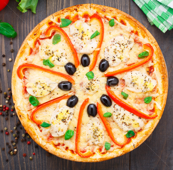 Pizza with chicken, pepper and olives Stock photo © vankad