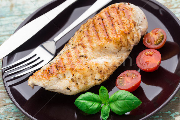 Pollo alla griglia seni piatto alimentare cena pomodoro Foto d'archivio © vankad