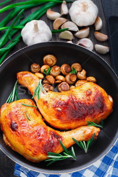 Roasted chicken legs Stock photo © vankad