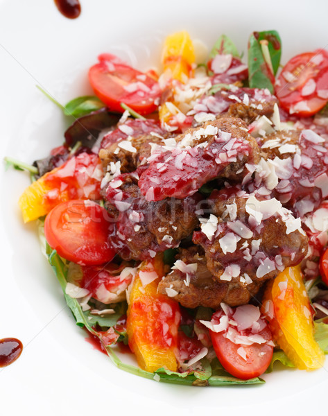 Warm salad with chicken liver in raspberry sauce Stock photo © vankad