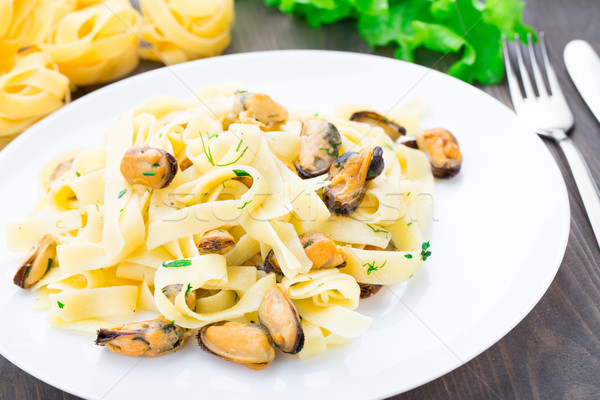 Pasta with mussels Stock photo © vankad