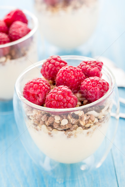 Yogurt muesli fresche lamponi colazione alimentare Foto d'archivio © vankad