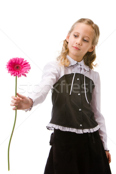 Stock photo: Portrait of a young beautiful girl with flower