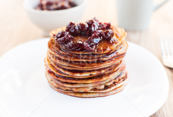 Delicious pancakes with cherry jam Stock photo © vankad