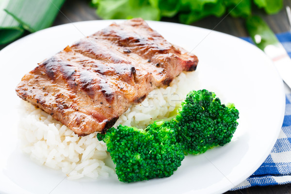 Grilled ribs with rice and broccoli Stock photo © vankad