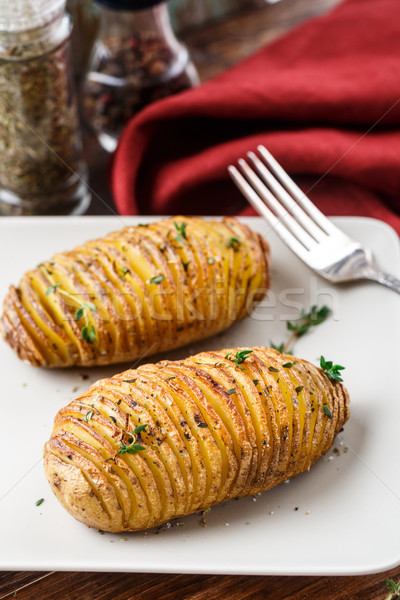 Hasselback potatoes Stock photo © vankad