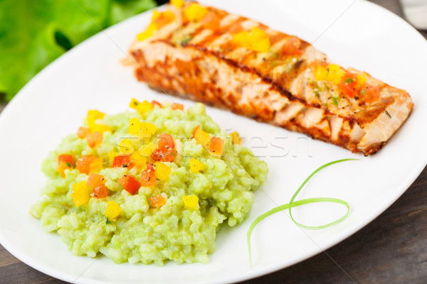 Creamy avocado rice with grilled salmon Stock photo © vankad