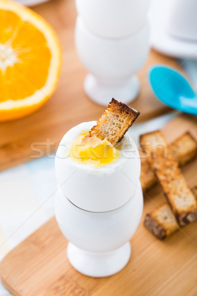 Breakfast with soft boiled eggs and toast soldiers Stock photo © vankad