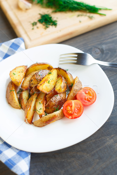 Sült krumpli koktélparadicsom tányér étel kék Stock fotó © vankad