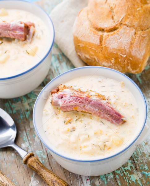 Cheese soup with smoked ribs Stock photo © vankad
