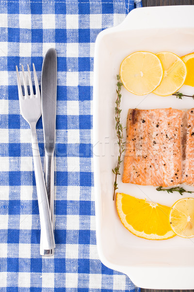 Salmon fillet with citrus and thyme Stock photo © vankad