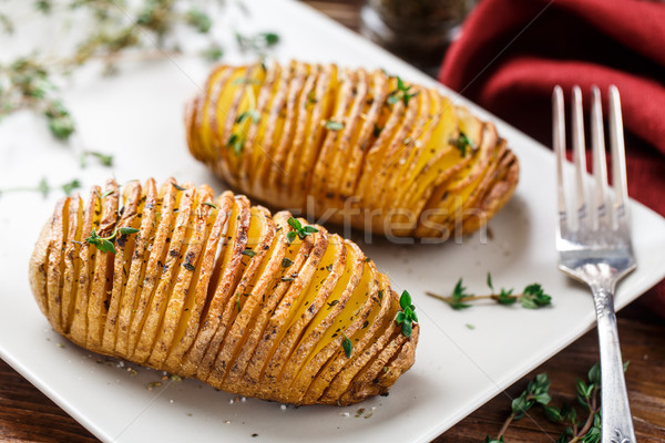 Hasselback potatoes Stock photo © vankad