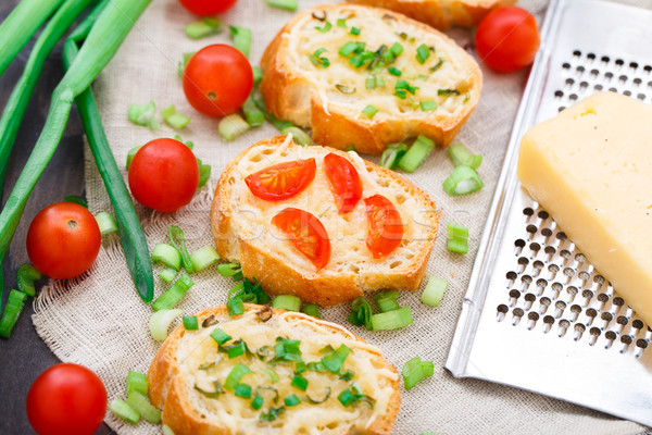 Bruschetta with cherry tomatoes and scallion Stock photo © vankad