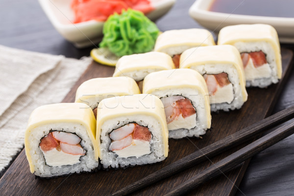 Sushi rolls with shrimps and cheddar cheese Stock photo © vankad