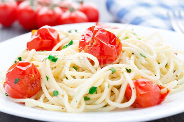 Spaghetti pomidory zioła tablicy obiedzie Zdjęcia stock © vankad