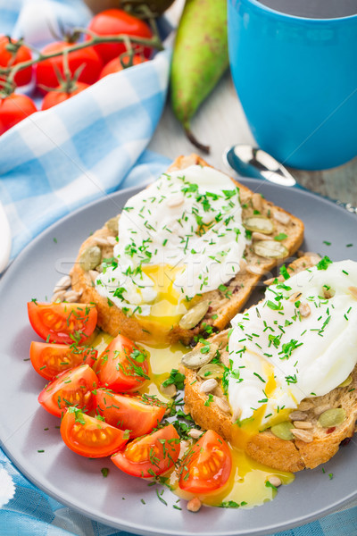 Stock photo: Sandwich with poached egg and cherry tomatoes