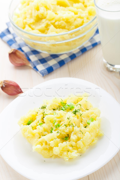 Mashed potatoes sprinkled with scallion and dill Stock photo © vankad