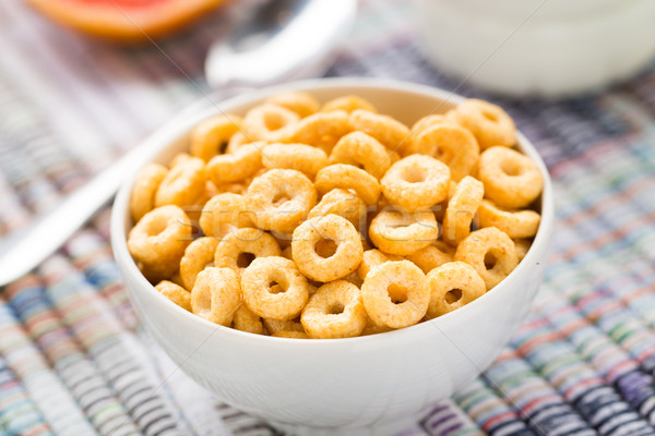 Bowl of honey corn rings Stock photo © vankad