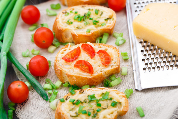 Bruschetta with cherry tomatoes and scallion Stock photo © vankad