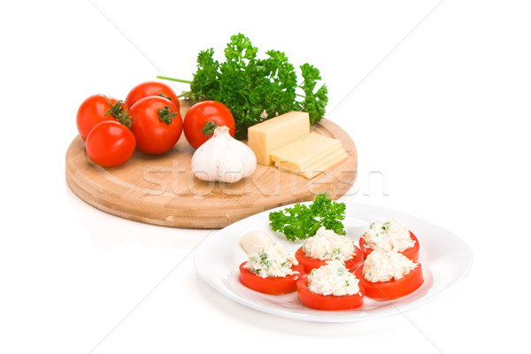 Sliced tomato with cheese sauce Stock photo © vankad