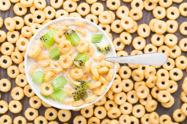 Bowl of honey corn rings Stock photo © vankad