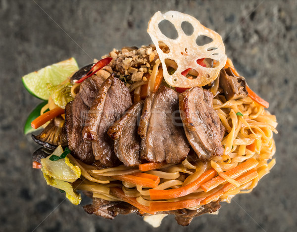Udon noodles with duck breast Stock photo © vankad
