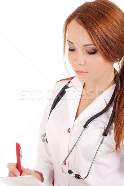 Jovem médico feminino escrita paciente história Foto stock © vankad
