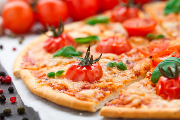 Stock photo: Vegetarian pizza with cherry tomatoes