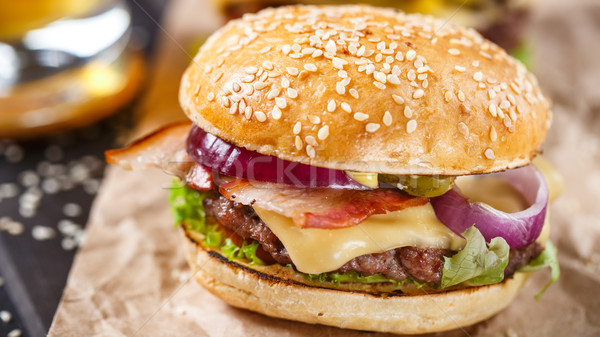 Delicious burger on wooden board Stock photo © vankad