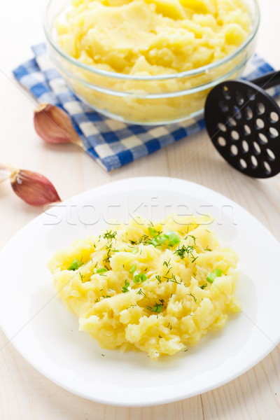 Mashed potatoes sprinkled with scallion and dill Stock photo © vankad