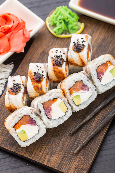 Sushi roll with salmon, tuna and eel Stock photo © vankad