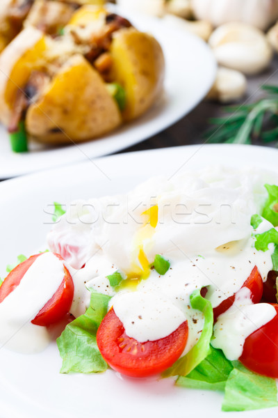 Vegetable salad with poached egg Stock photo © vankad