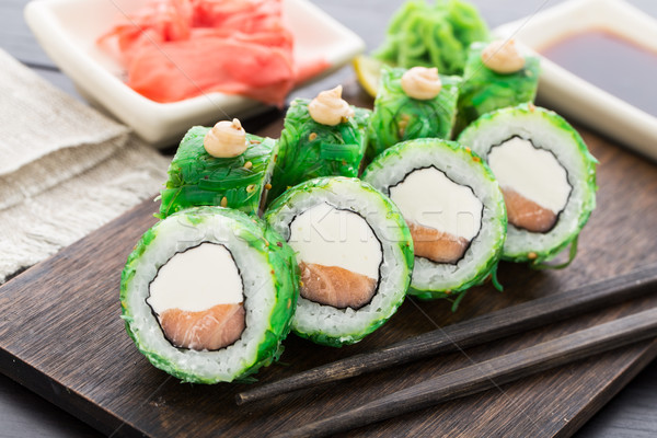 Sushi rolls covered with chuka Stock photo © vankad