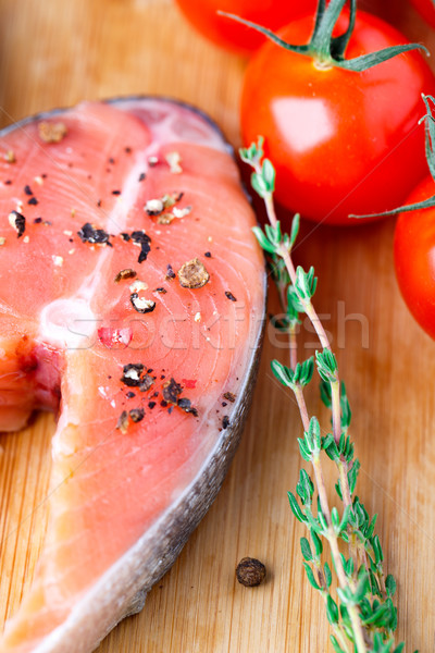 Salmon steak with thyme and pepper Stock photo © vankad