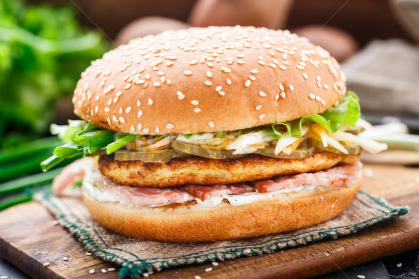 Burger with potato pancake and bacon Stock photo © vankad