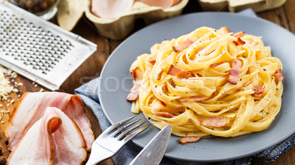 Pasta carbonara on a plate Stock photo © vankad