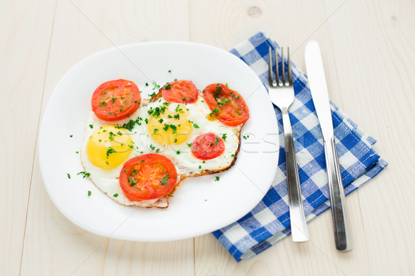 Tükörtojás tányér fény reggeli paradicsom tojás Stock fotó © vankad