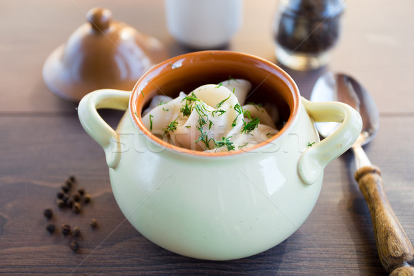 Fresh boiled meat dumplings served with dill Stock photo © vankad