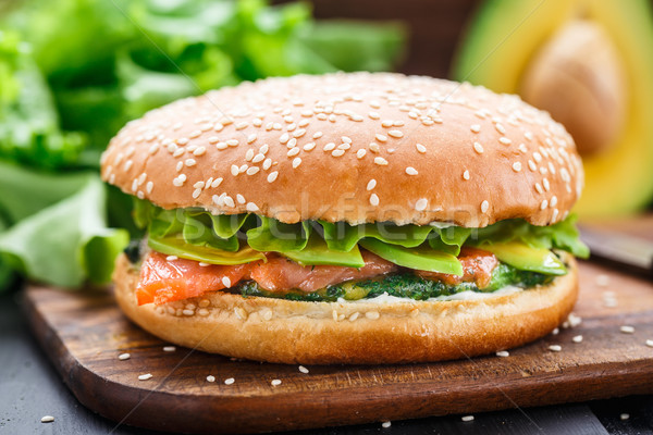 Burger with salmon and avocado Stock photo © vankad
