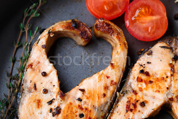 Salmon steak with thyme and pepper Stock photo © vankad