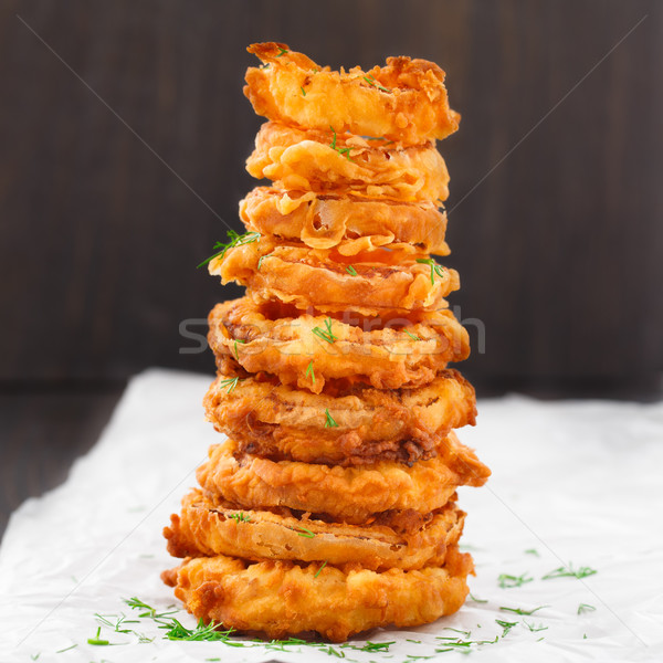 Homemade crunchy fried onion rings Stock photo © vankad