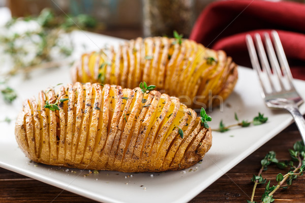 Hasselback potatoes Stock photo © vankad