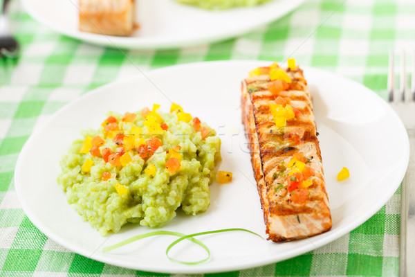 Creamy avocado rice with grilled salmon Stock photo © vankad