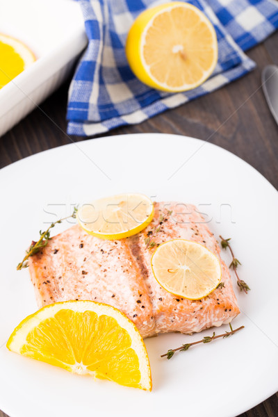 Salmon fillet with citrus and thyme Stock photo © vankad
