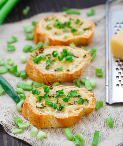 Bruschetta with cheese and scallion Stock photo © vankad
