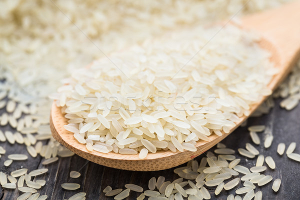 White uncooked rice in a spoon Stock photo © vankad