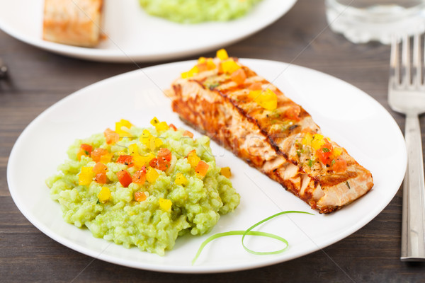 Creamy avocado rice with grilled salmon Stock photo © vankad