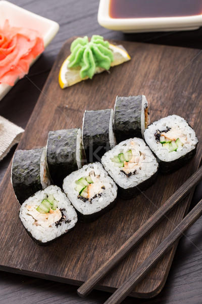 Stock photo: Sushi rolls with eel, cucumber and sesame seed